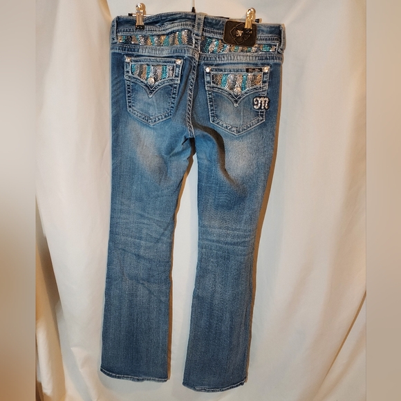 Miss Me Denim - Miss Me Low Rise Edgy Boot Cut Jeans with Embellished Pockets
